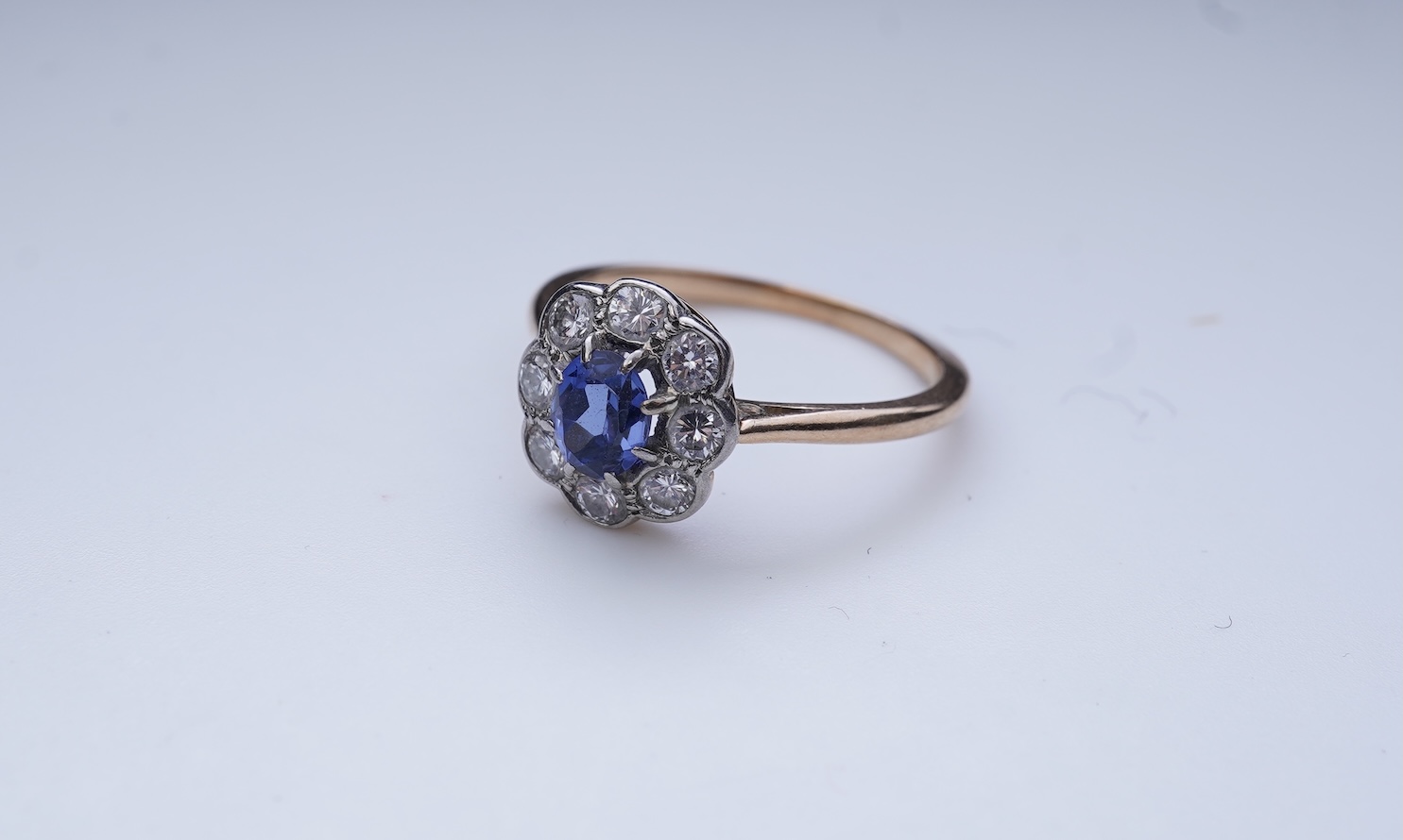 A synthetic sapphire and diamond ring